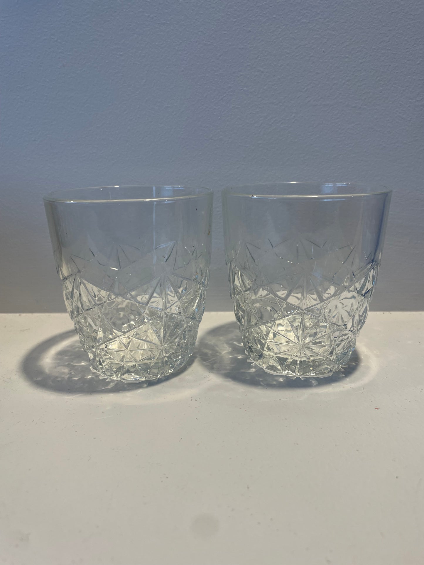 2 heavy whiskey glasses