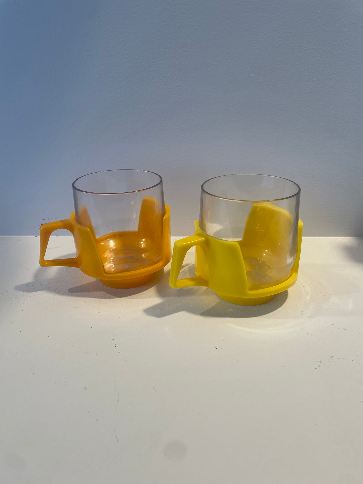 Yellow and Orange Plastic Bodum Style Mugs