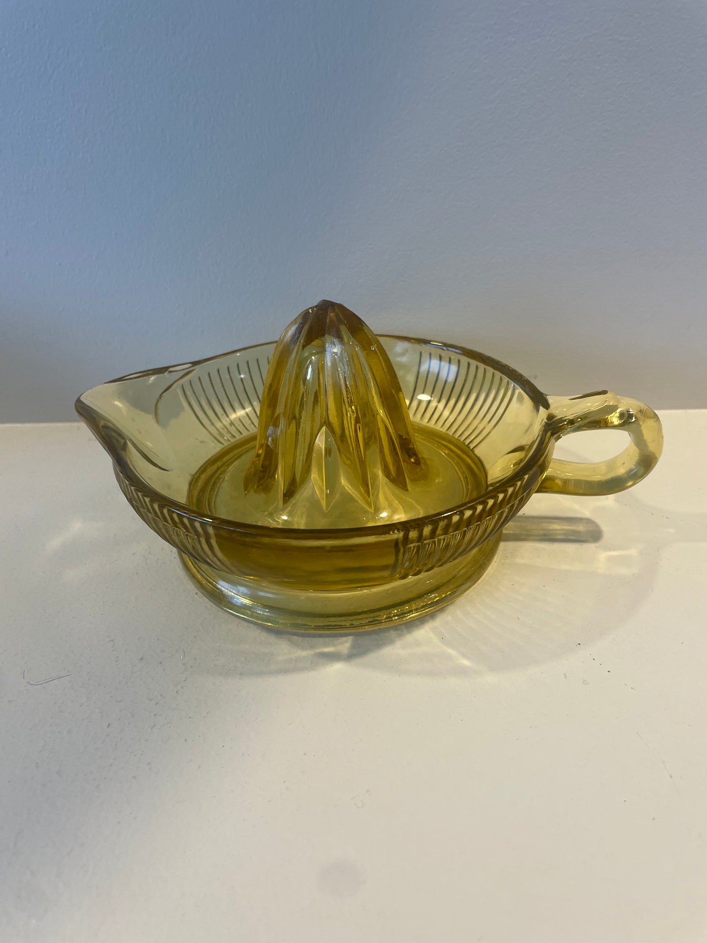 Large vintage yellow glass lemon squeezer