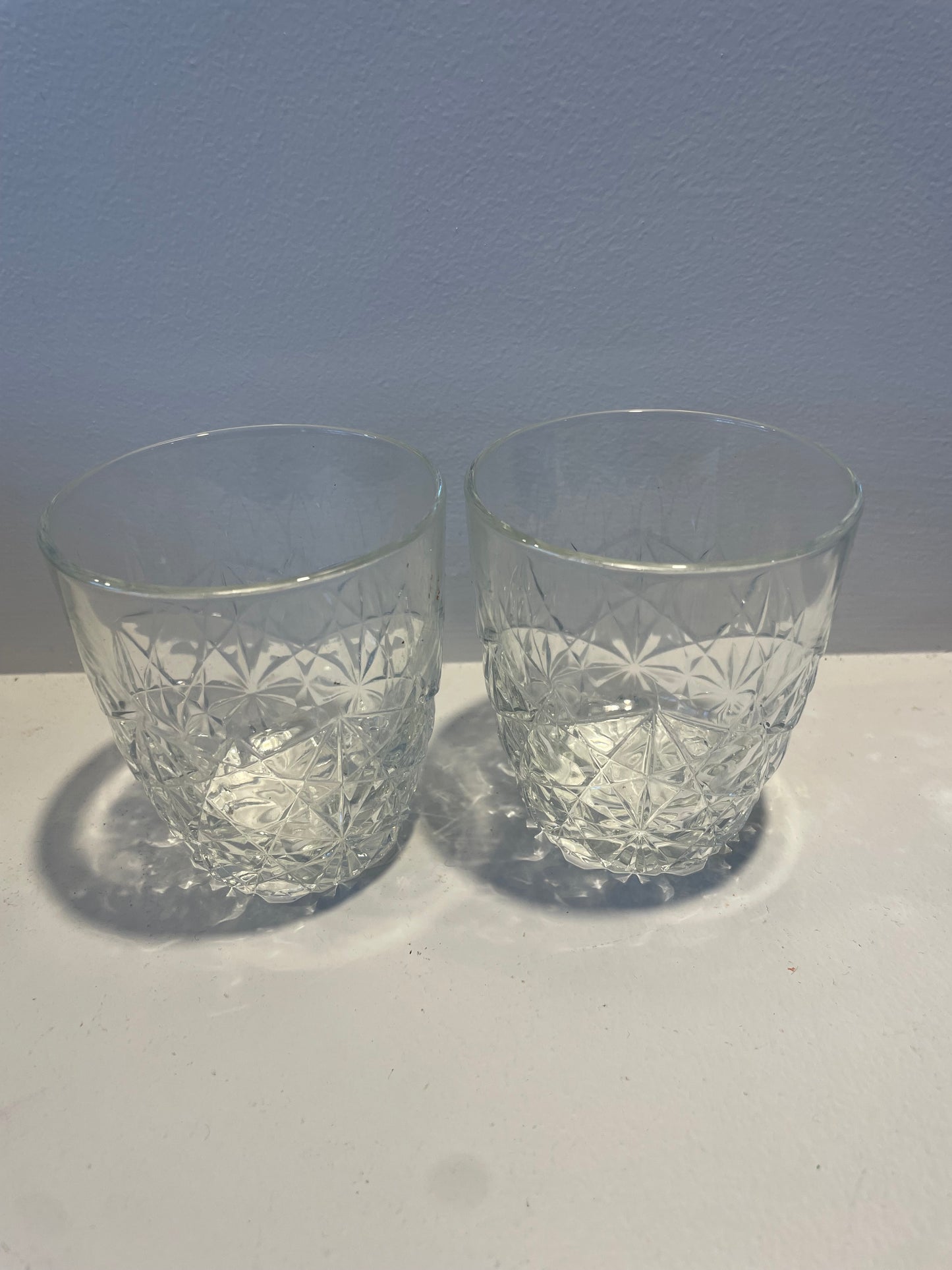 2 heavy whiskey glasses