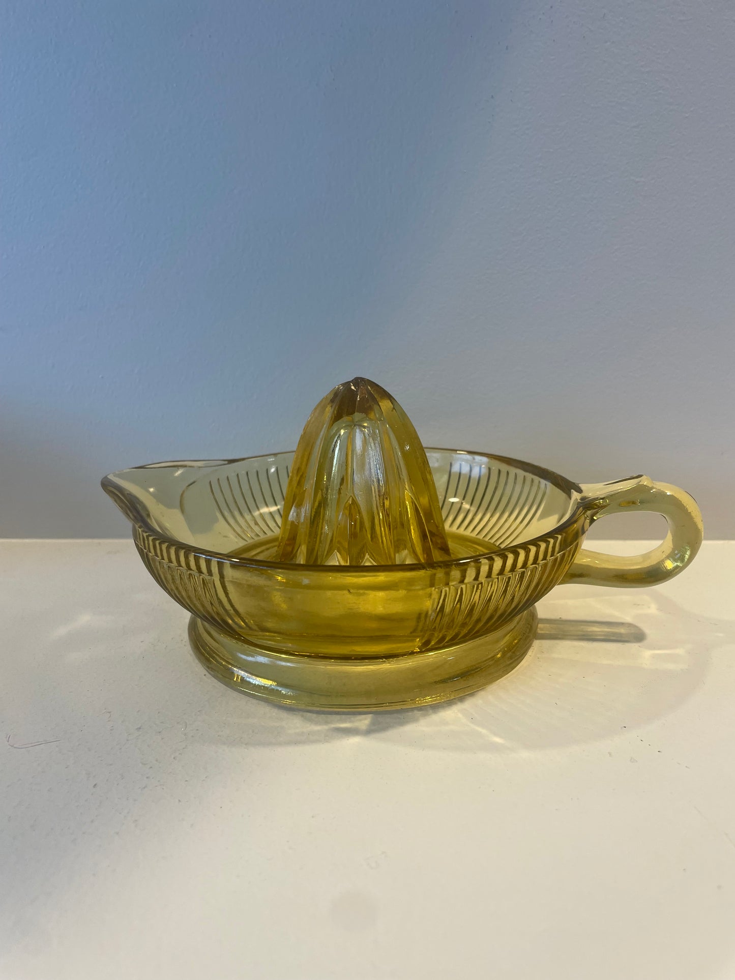 Large vintage yellow glass lemon squeezer