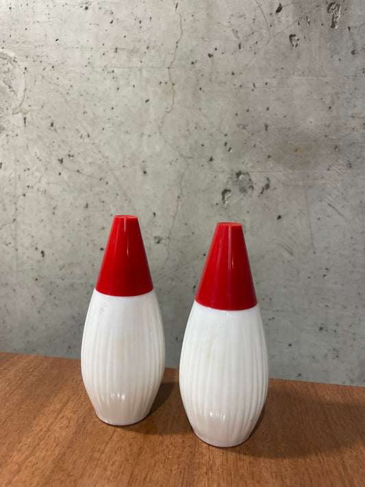 Milk Glass and Red Bakelite Salt and Pepper Shakers