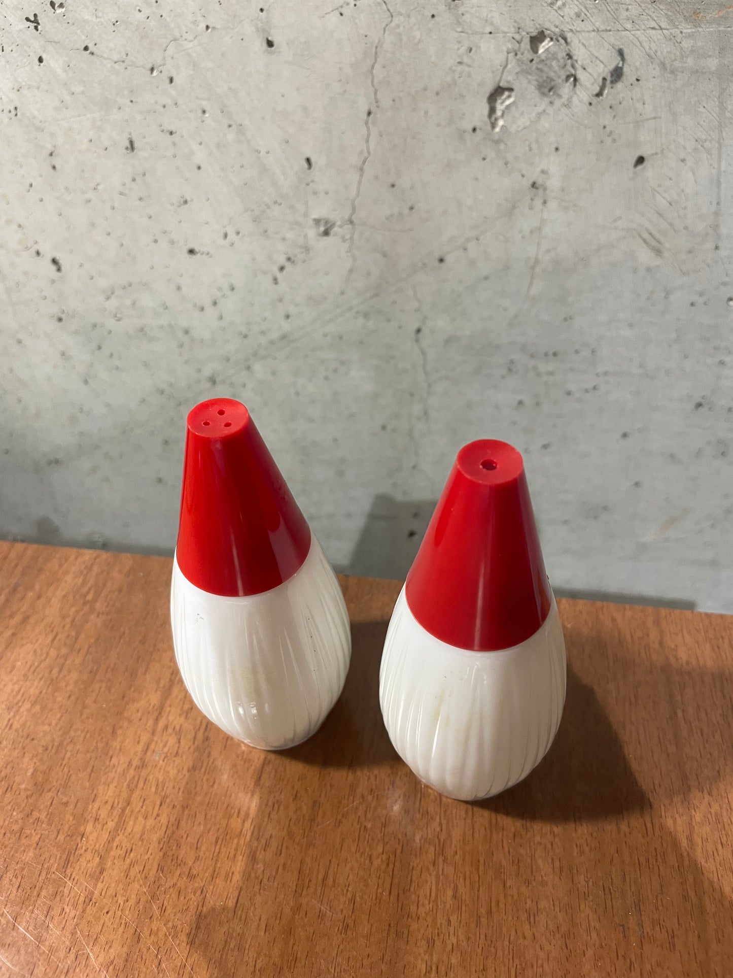 Milk Glass and Red Bakelite Salt and Pepper Shakers